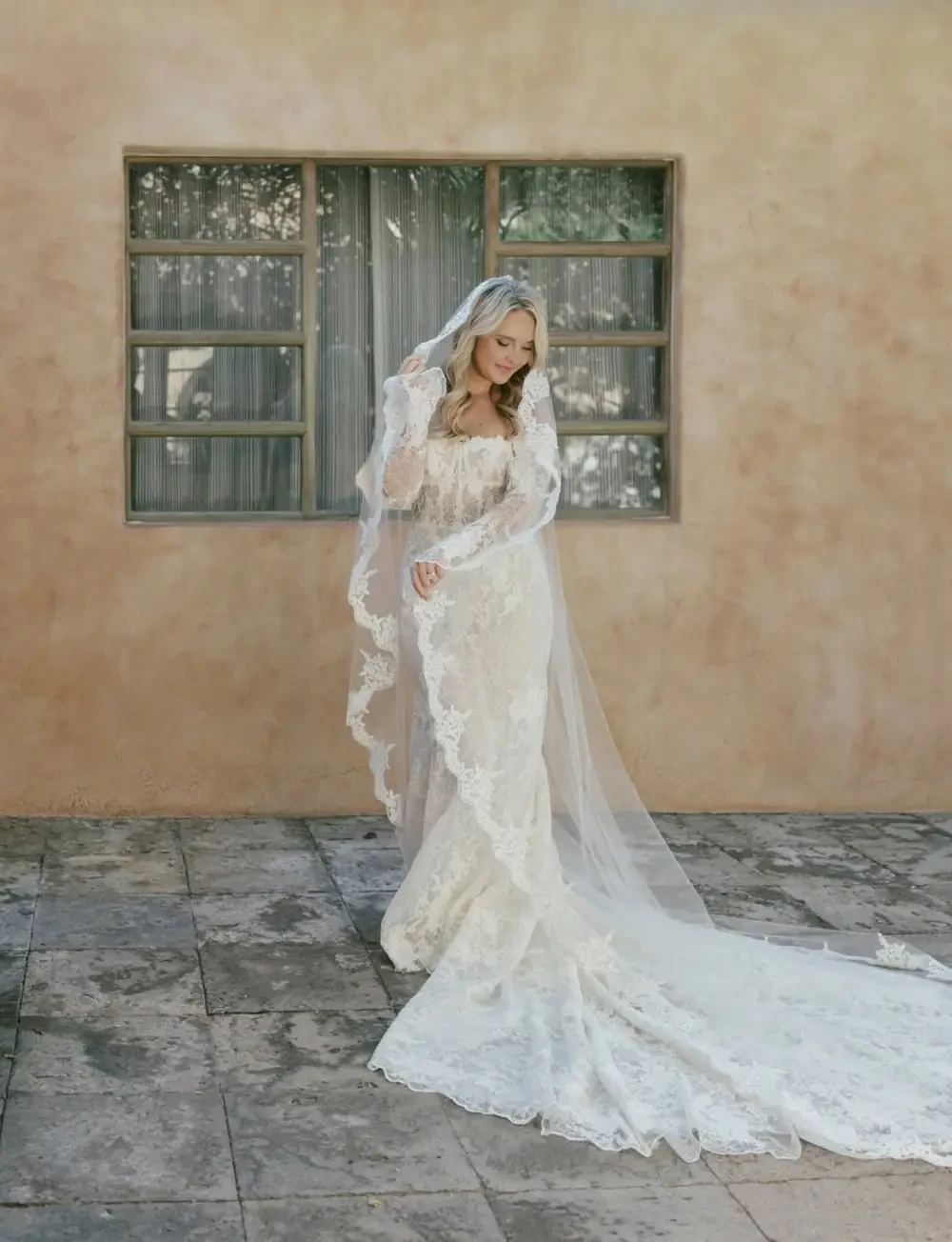 Model wearing a white gown