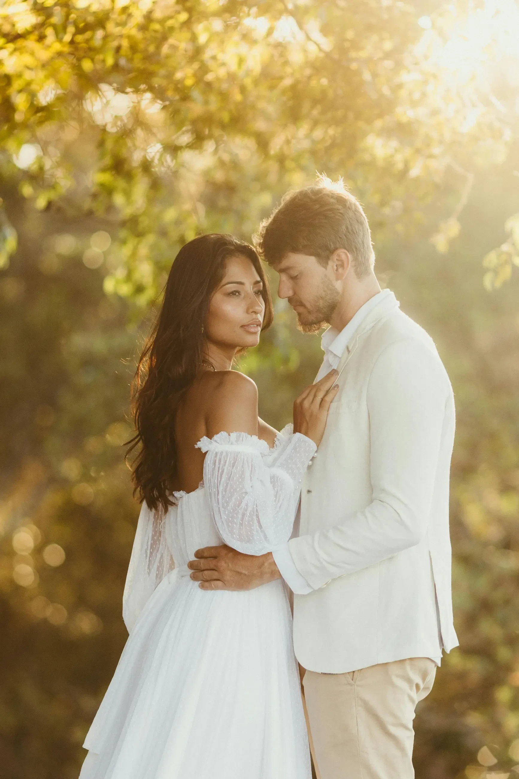 image shows a man and woman on their wedding day